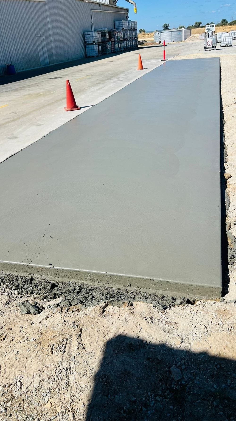 Freshly poured commercial concrete slab by SID & Jazz Concreters